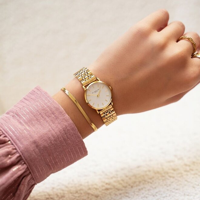 Round watch with a small white dial
