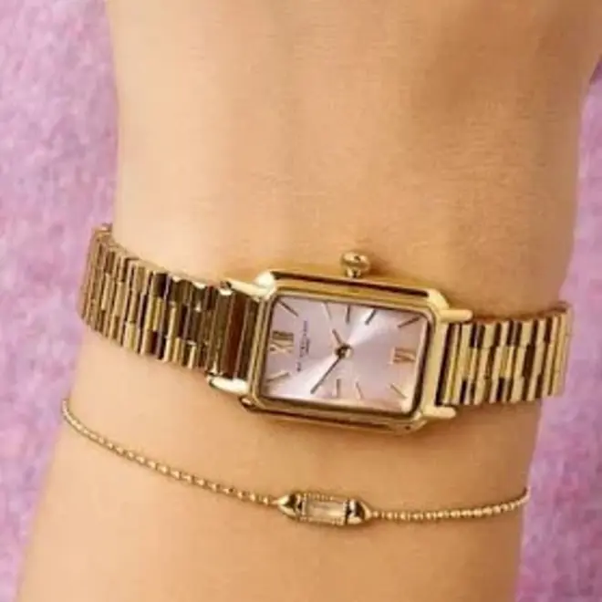 Square watch with a light pink dial
