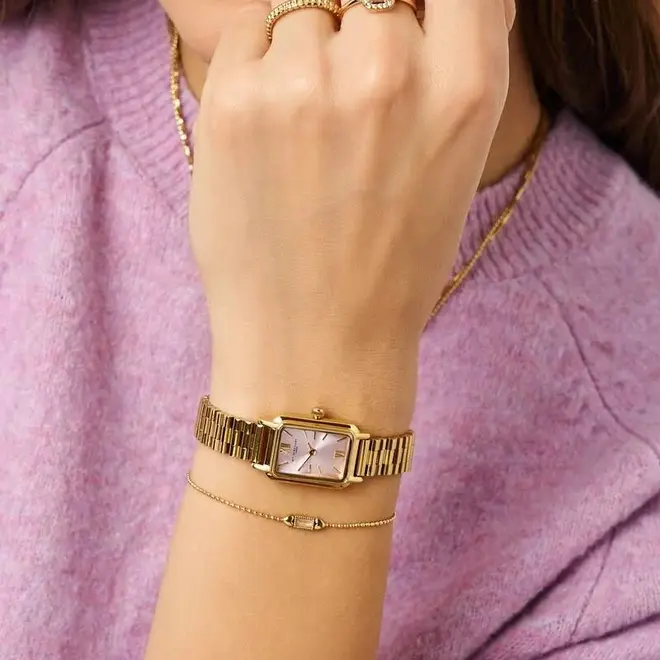 Square watch with a light pink dial