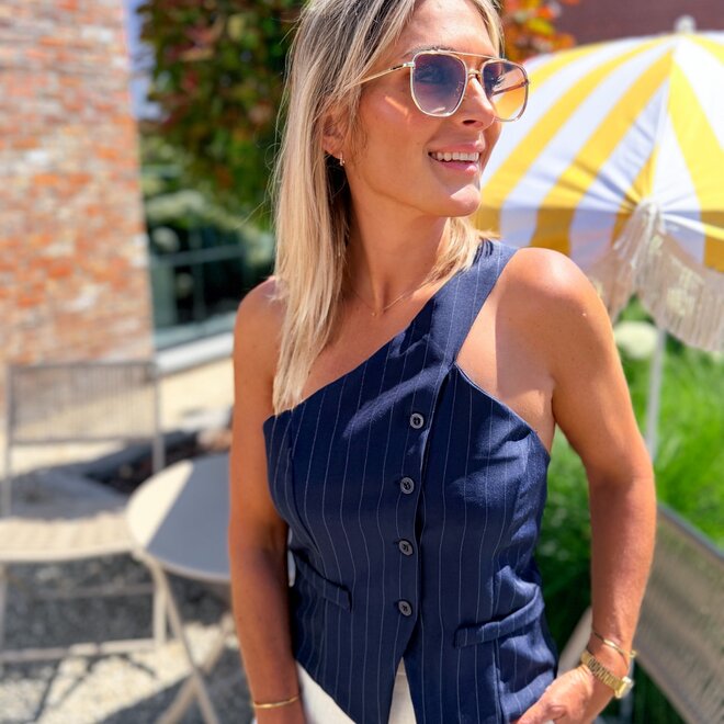 Midnight Asymmetry Top