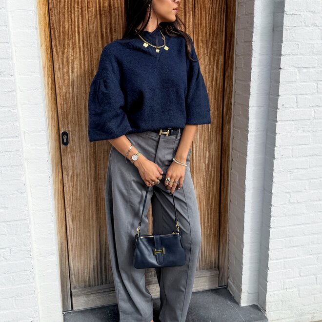 * Poches pantalon gris
