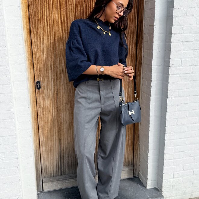 * Poches pantalon gris