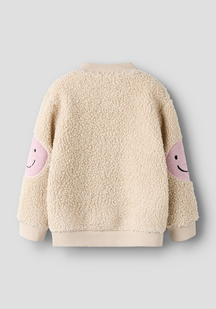 Name it NMFOLFIA NREG TEDDY CARD Peyote