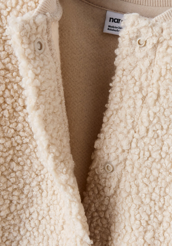 Name it NMFOLFIA NREG TEDDY CARD Peyote