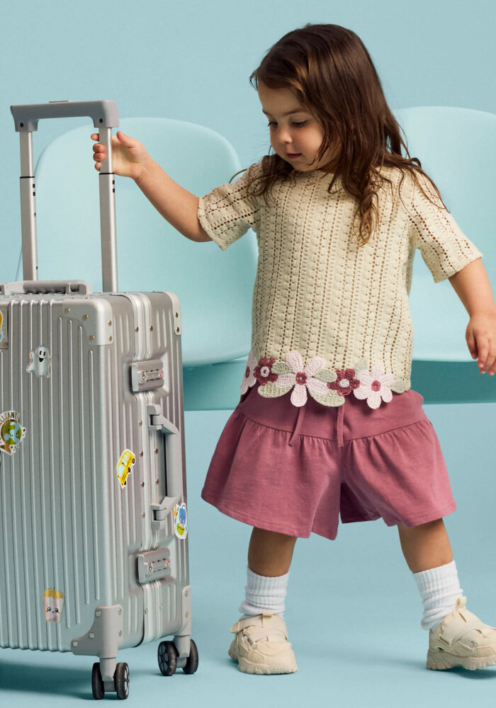 name it NMFHADIA SS TOP Almond Milk