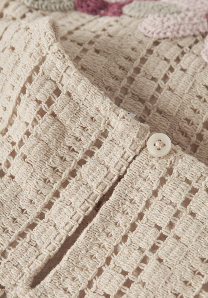 name it NMFHADIA SS TOP Almond Milk