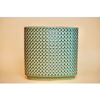 Hoge smalle stenen pot met reliëf