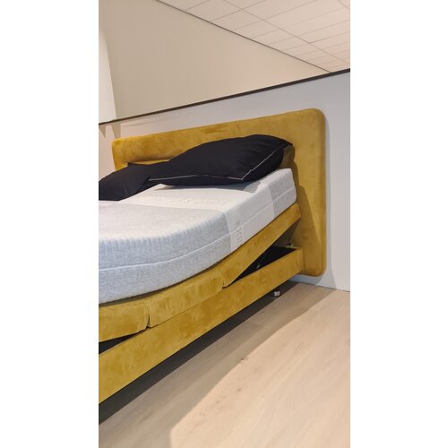 Sleepfast Showmodel Bas Boxspring geel 180x200 elektrisch