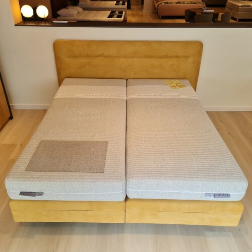 Sleepfast Showmodel Bas Boxspring geel 180x200 elektrisch