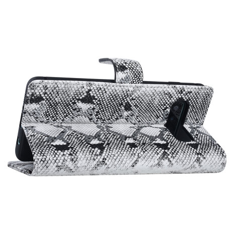 UNIQ Accessory UNIQ Accessory Galaxy S10 Plus Noir et Blanc Peau de serpent Book type housse UNIQ Accessory UNIQ Accessory Galaxy S10 Plus Noir et Blanc Peau de serpent Book type housse