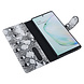 UNIQ Accessory UNIQ Accessory Galaxy Note 10 Plus Noir et Blanc Peau de serpent Book type housse UNIQ Accessory UNIQ Accessory Galaxy Note 10 Plus Noir et Blanc Peau de serpent Book type housse