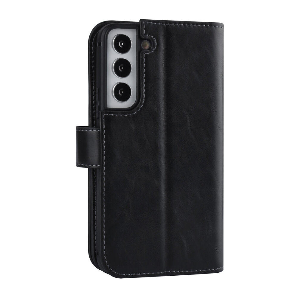 UNIQ Accessory UNIQ Accessory Samsung Galaxy S22 Book-Case hul - Kartenhalter für 9 Karten - Magnetverschluss - Schwarz UNIQ Accessory UNIQ Accessory Samsung Galaxy S22 Book-Case hul - Kartenhalter für 9 Karten - Magnetverschluss - Schwarz