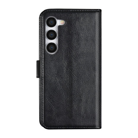 UNIQ Accessory UNIQ Accessory Galaxy S23 Book Case hoesje - Pasjeshouder voor 3 pasjes - Hanger - Zwart UNIQ Accessory UNIQ Accessory Galaxy S23 Book Case hoesje - Pasjeshouder voor 3 pasjes - Hanger - Zwart