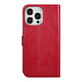 UNIQ Accessory UNIQ Accessory iPhone 15 Pro Max Book Case hoesje - Pasjeshouder voor 3 pasjes - Magneetsluiting - Hanger - Rood