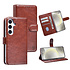 TUNIQ Galaxy S25 Book type case - Card holder for 3 cards - Magnetic closure - Hanger - Brown TUNIQ Galaxy S25 Book type case - Card holder for 3 cards - Magnetic closure - Hanger - Brown