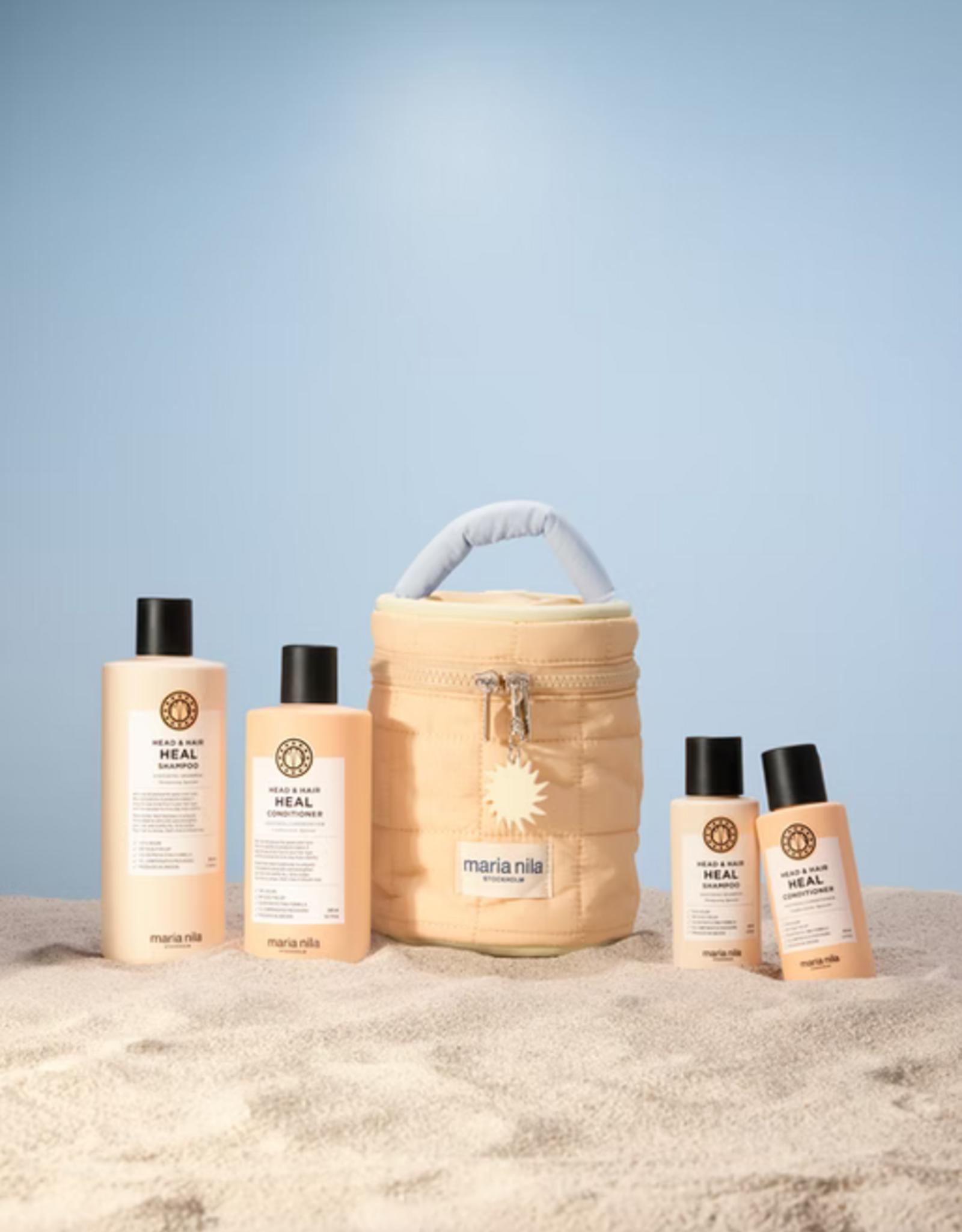 Maria Nila BEAUTY BAG HEAD & HEAL - koop: shampoo 350ml  + conditioner 300ml, extra: shampoo 100ml + conditioner 100ml