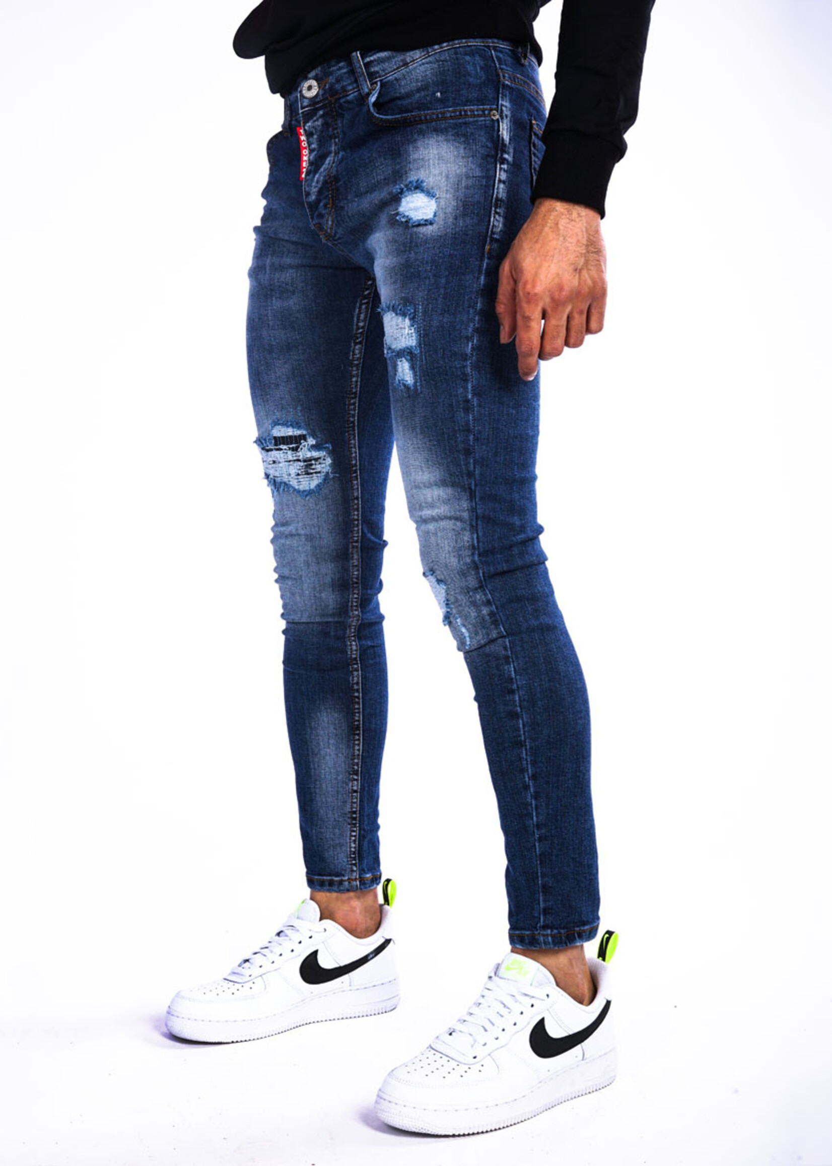 Jeans met scheuren