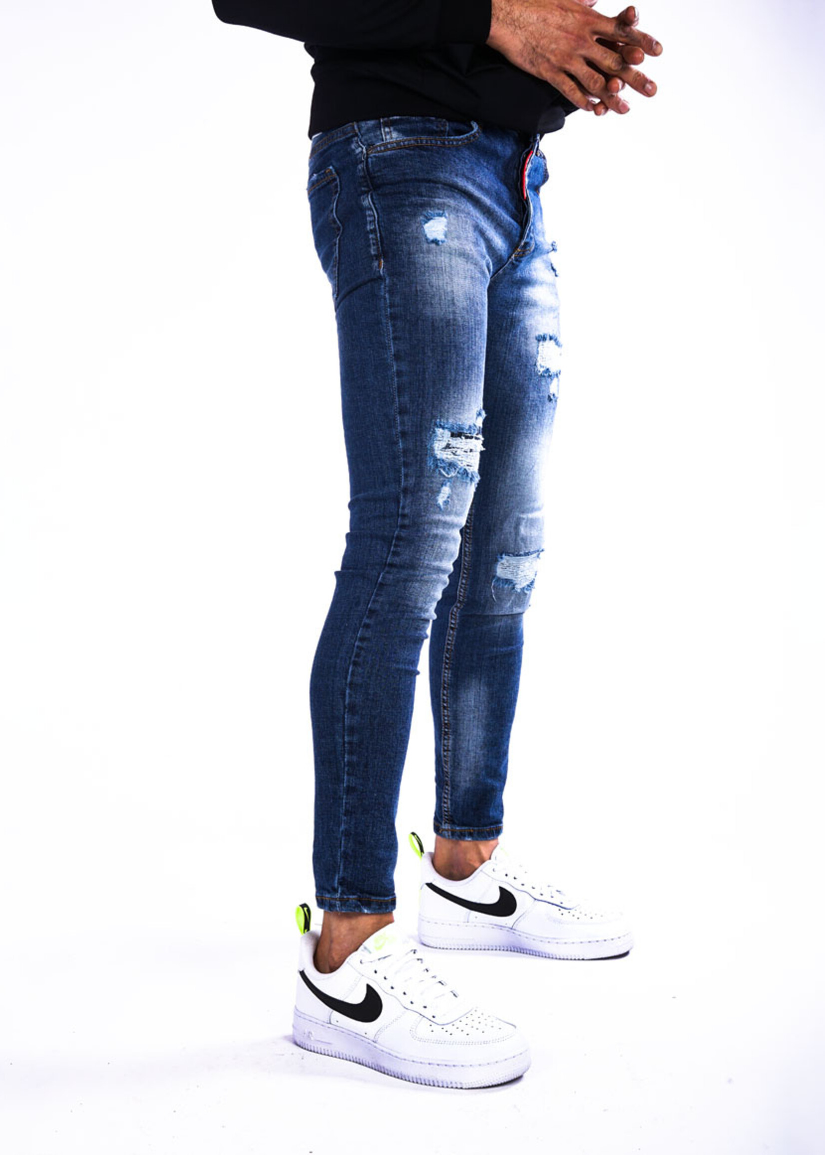 Jeans met scheuren