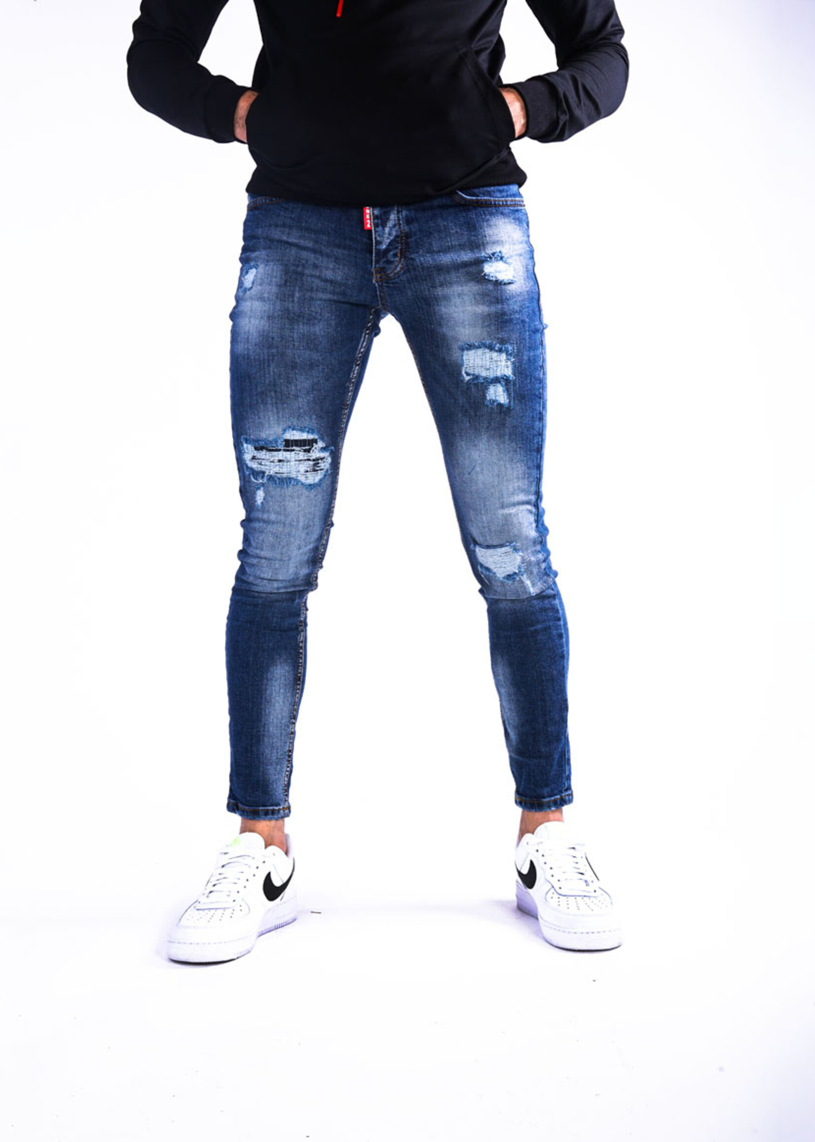 Jeans met scheuren