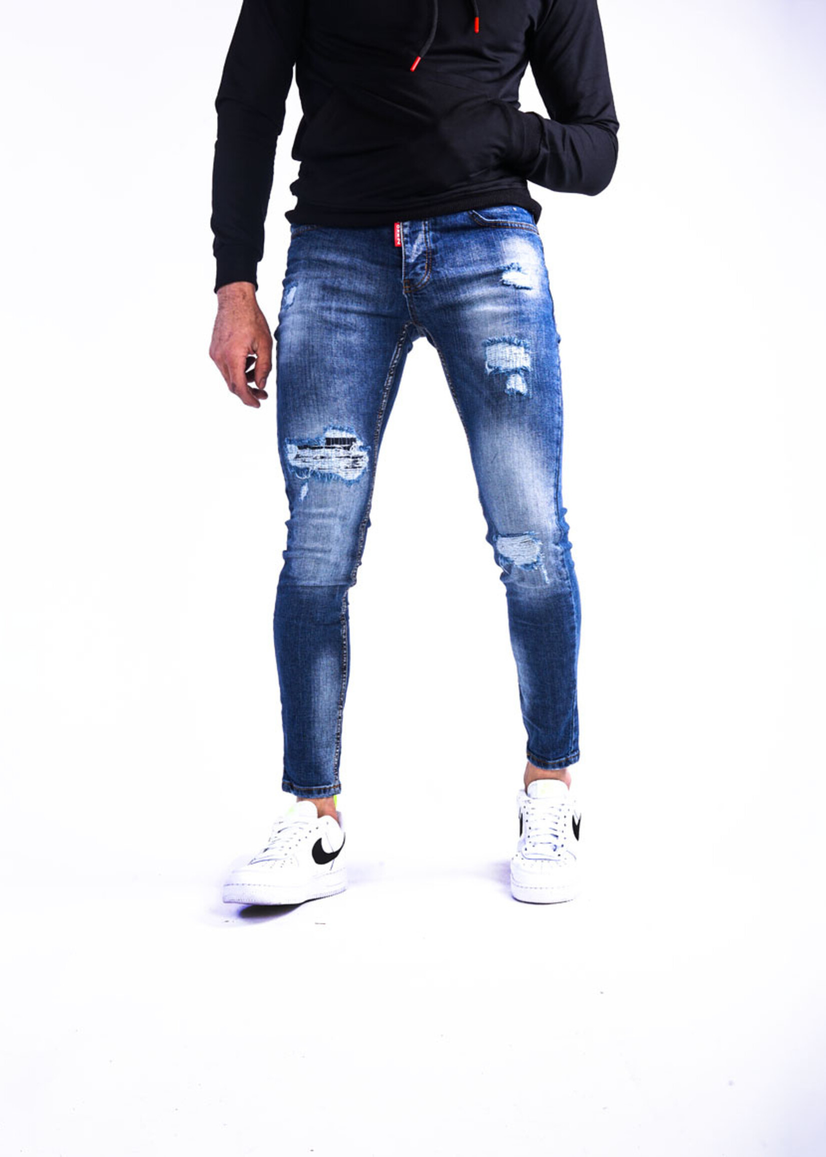 Jeans met scheuren