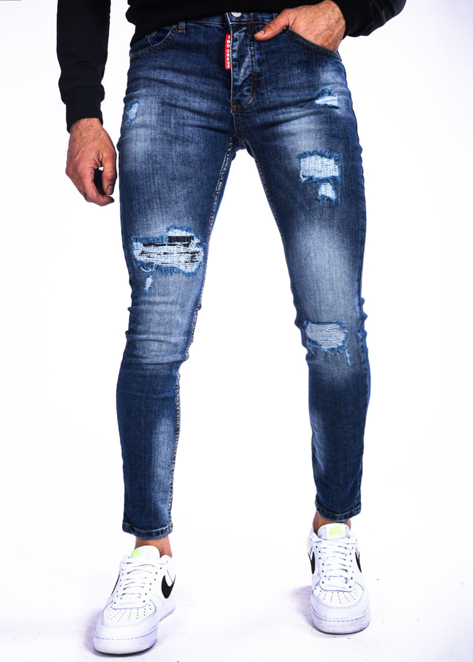 Jeans met scheuren