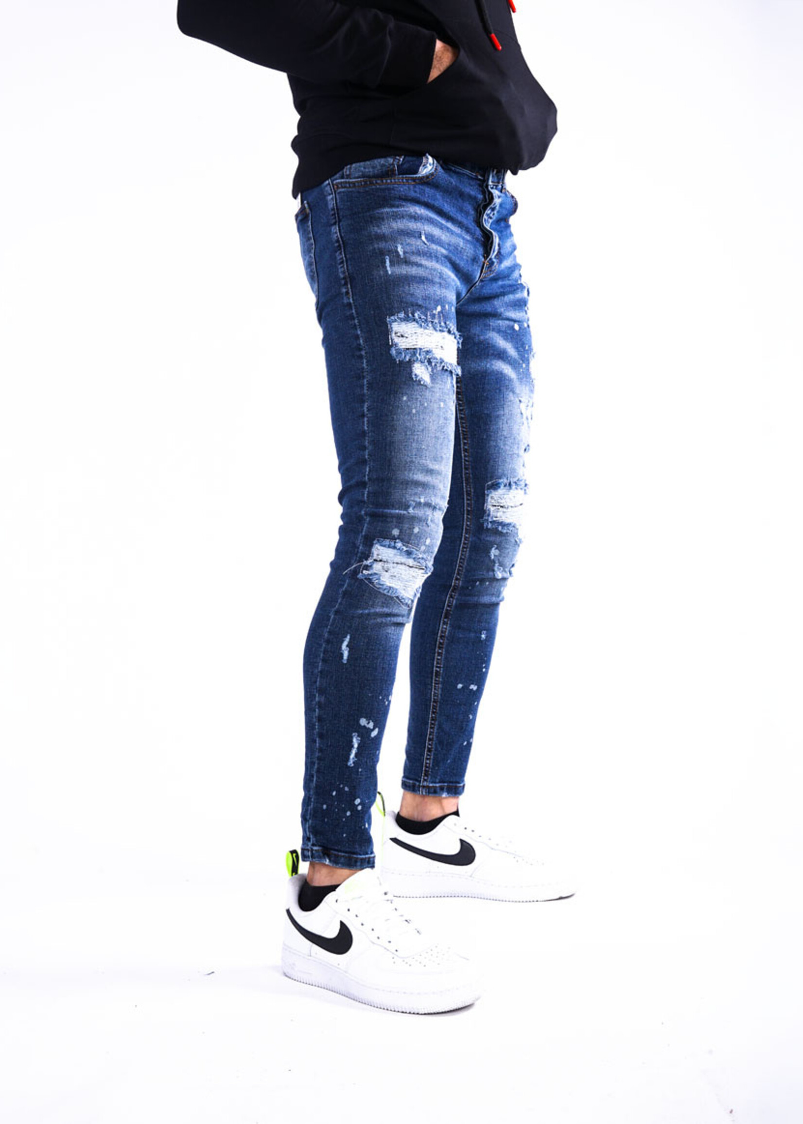 Jeans met scheuren blauw