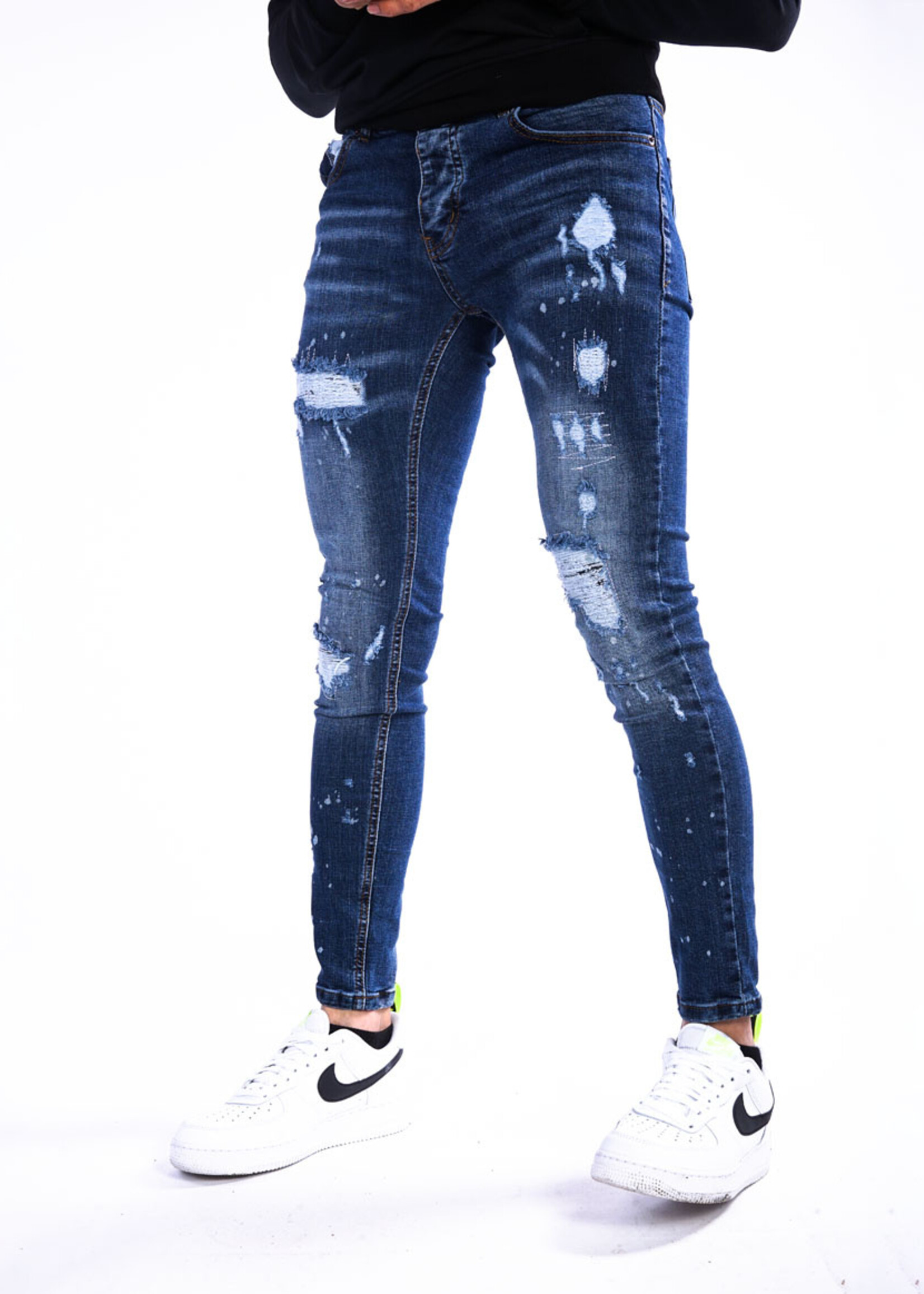 Jeans met scheuren blauw