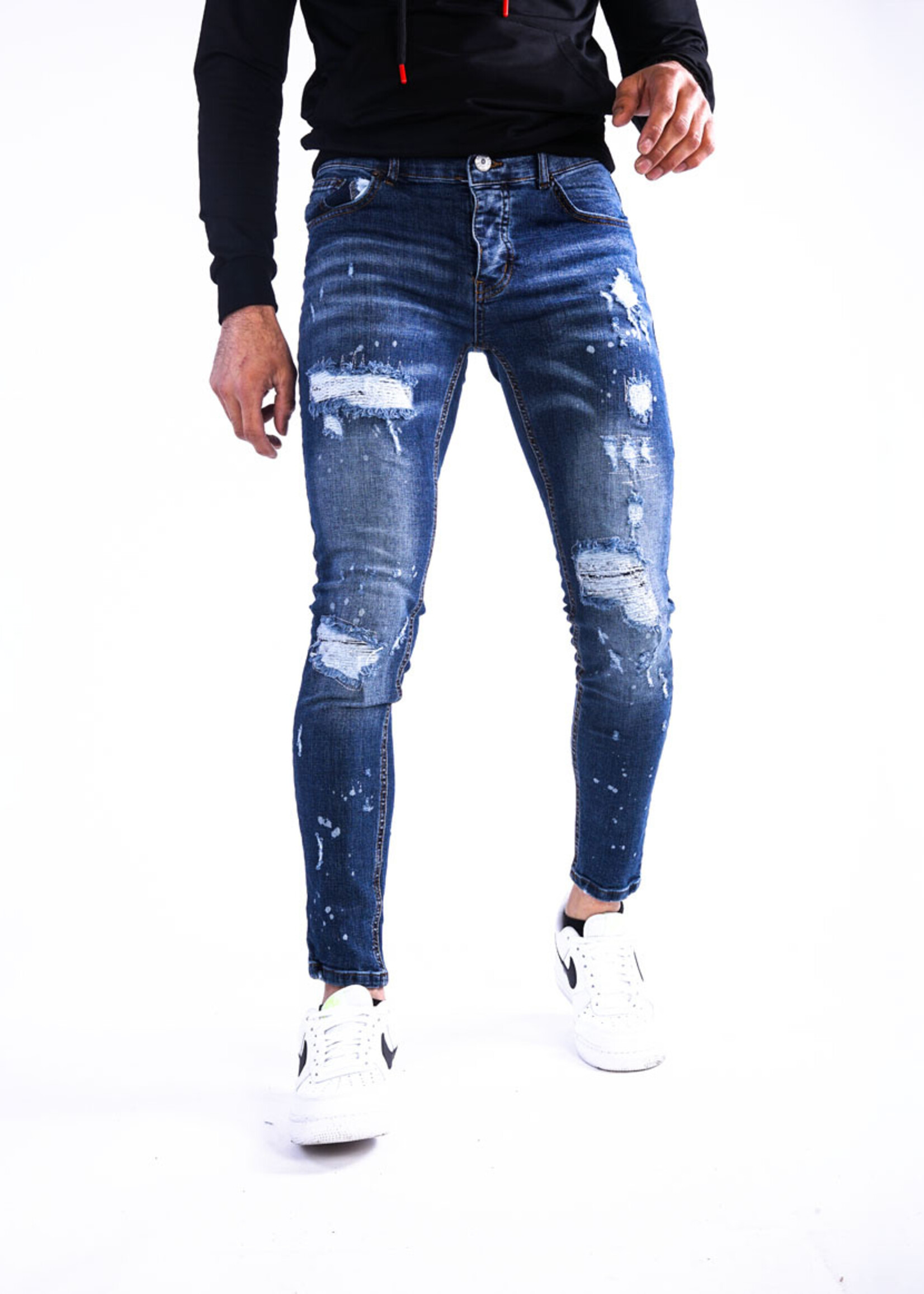 Jeans met scheuren blauw