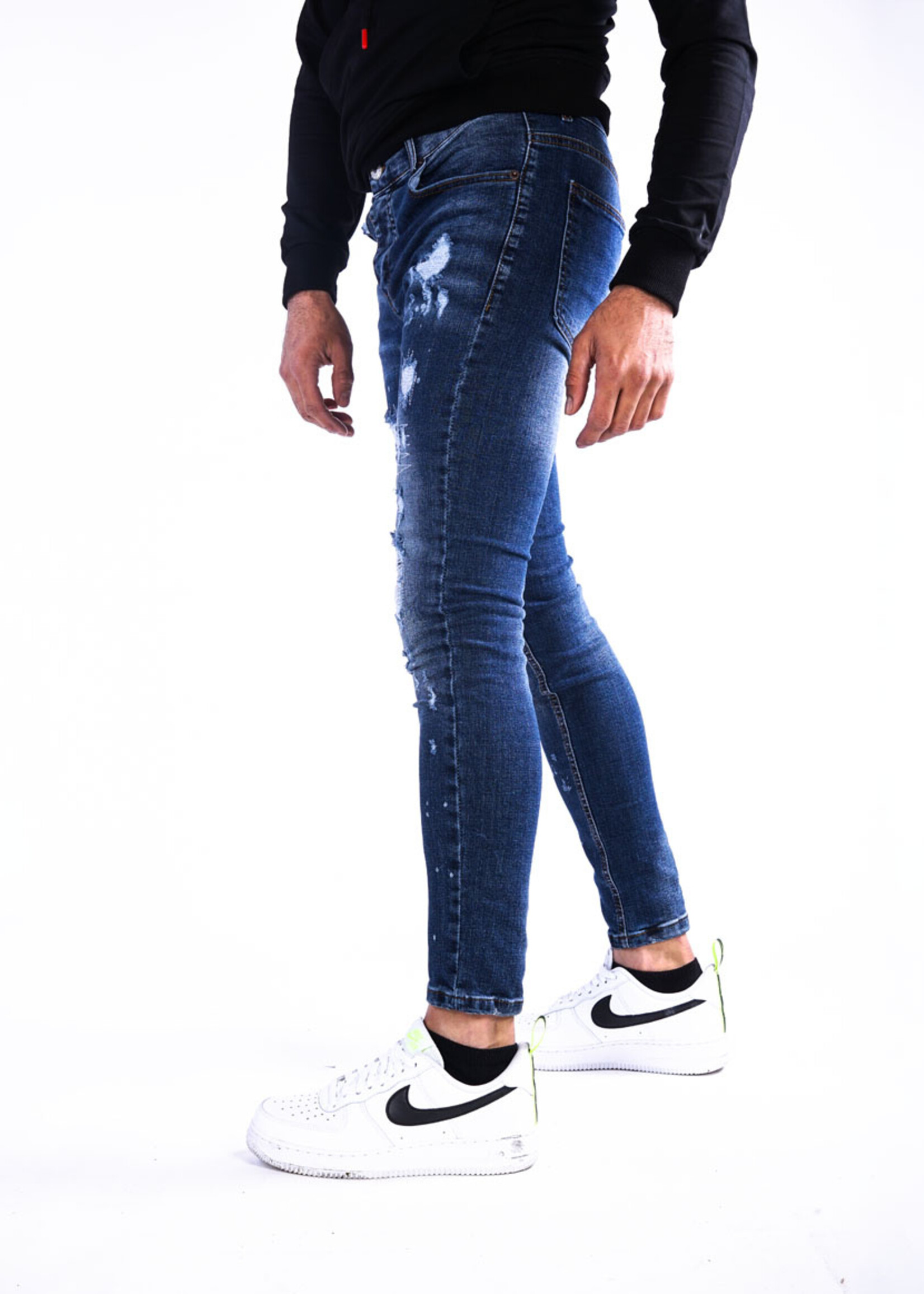 Jeans met scheuren blauw