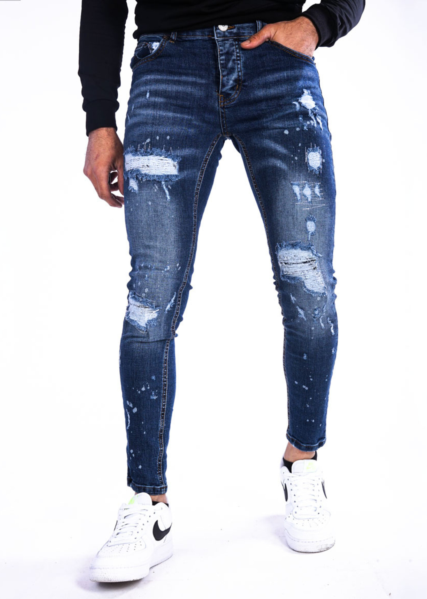 Jeans met scheuren blauw