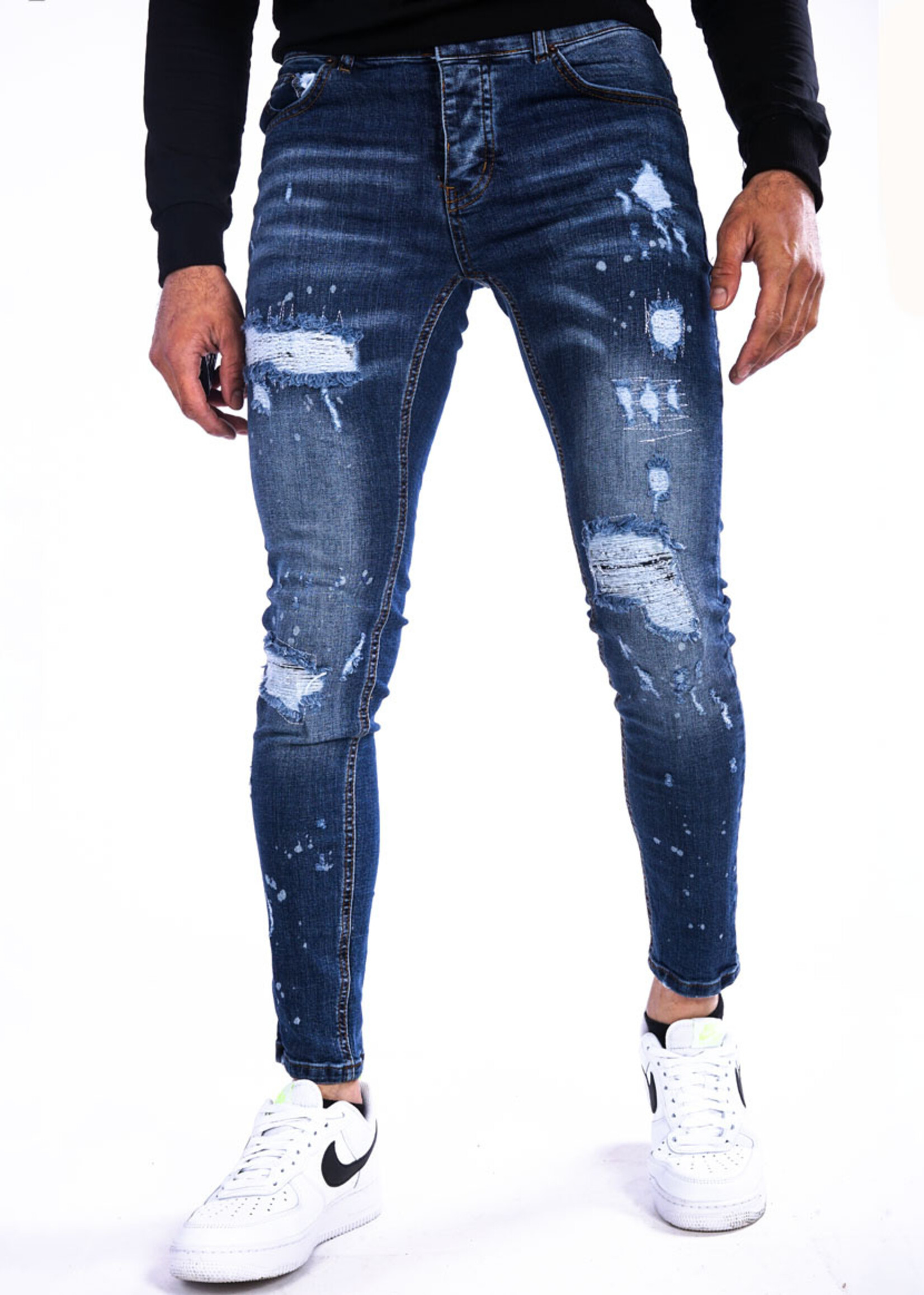 Jeans met scheuren blauw