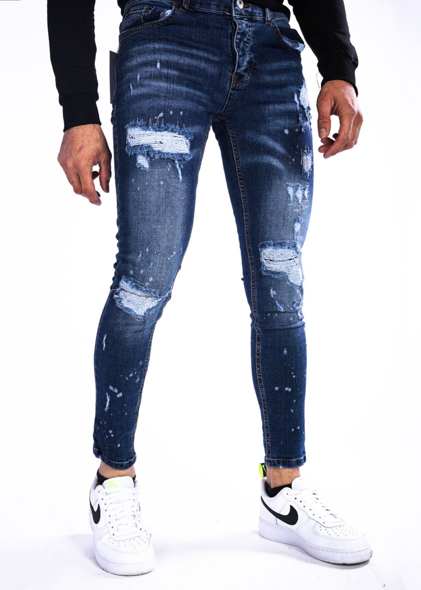 Jeans met scheuren blauw