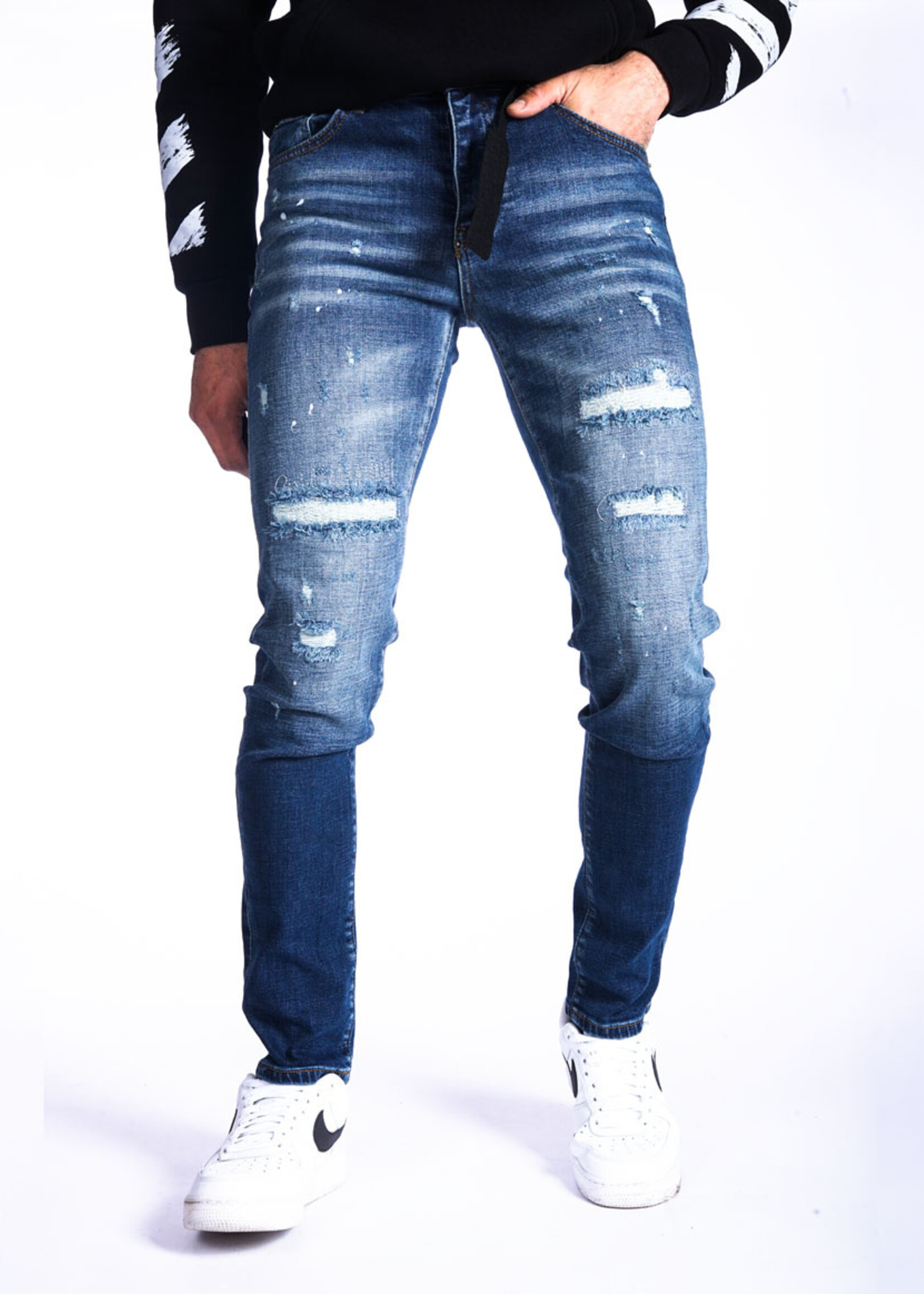 Jeans met scheuren - blauw