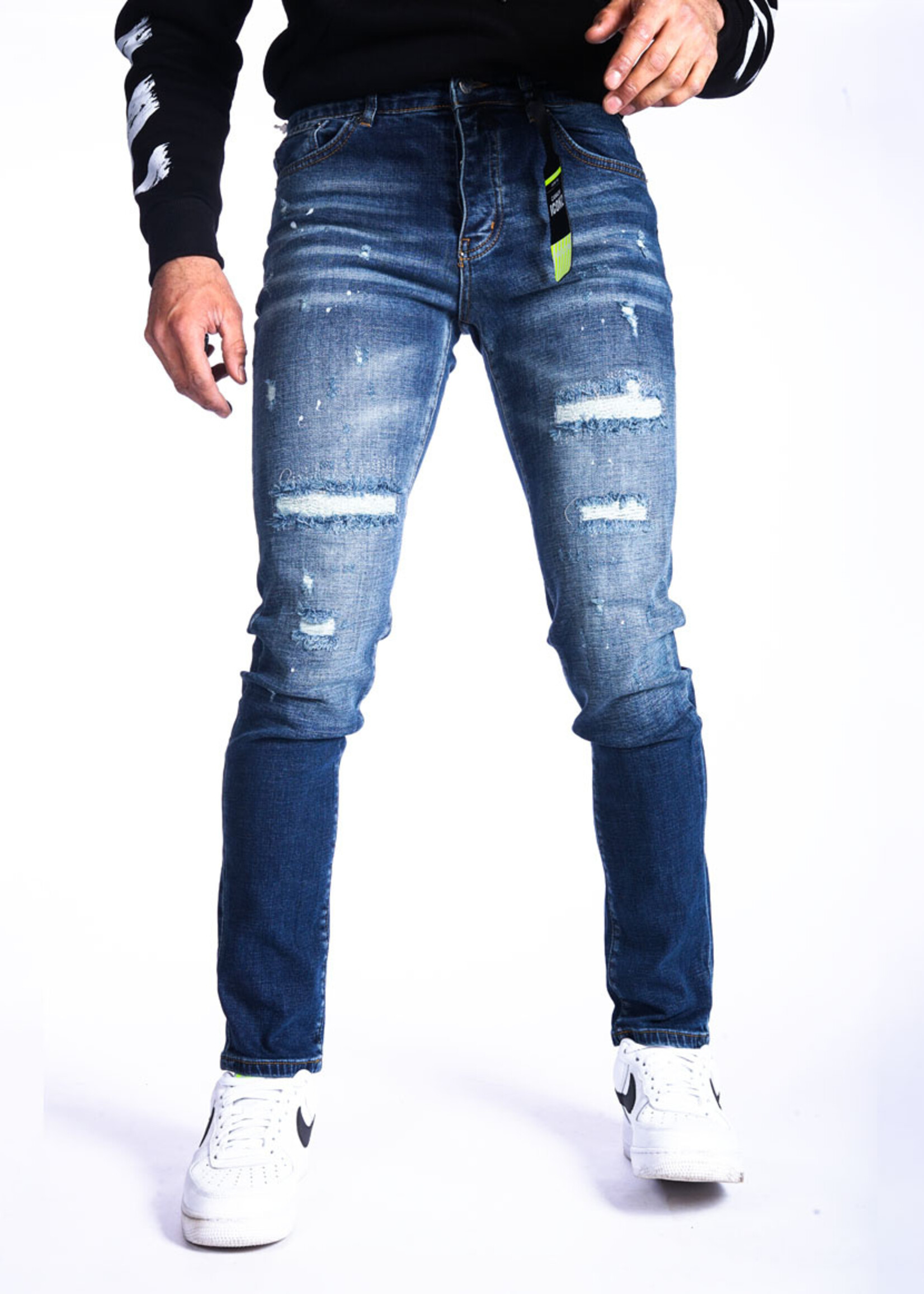 Jeans met scheuren - blauw