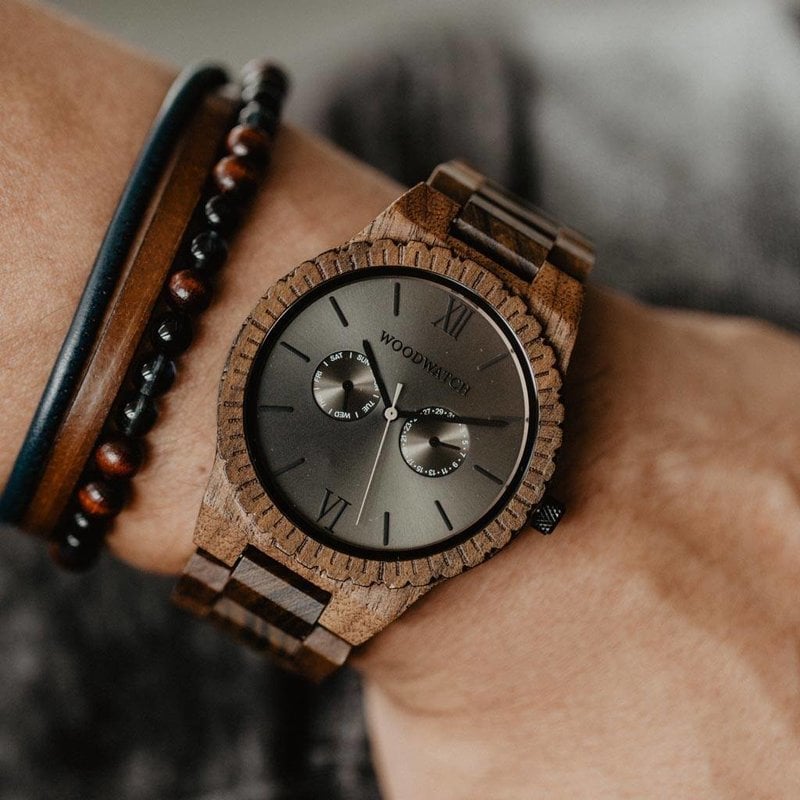 This premium designed watch combines unique new wood types with a luxurious stainless steel dial and backplate. At the heart of the timepiece comes an all new multi-function movement that includes two extra subdials featuring a week and month display. The