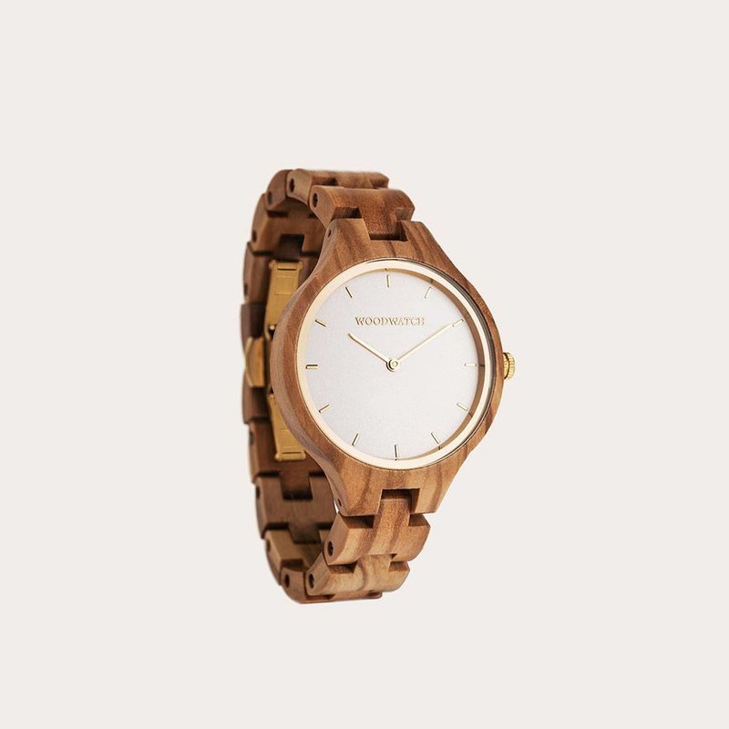 The AURORA Collection breaths the fresh air of Scandinavian nature and the astonishing views of the sky. This light weighing watch is made of European Olive Wood, accompanied by a light stainless-steel dial with a golden highlight and shining golden detai