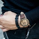 A combination of unique materials with a minimal design to create a timeless look. This modern watch suits both your casual day look and your finest formal wear. A super thin case made of the finest stainless steel with a matte black finish. A statement o