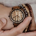 A combination of unique materials with a minimal design to create a timeless look. This modern watch suits both your casual day look and your finest formal wear. A super thin case made of the finest stainless steel with a matte black finish. A statement o