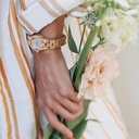 The Blossom watch from the FLORA Collection consists of soft olive wood that has been hand-crafted to its finest slenderness. The Blossom dial is made of a brushed cream coloured stainless-steel dial that has a shiny touch and rose gold coloured details.