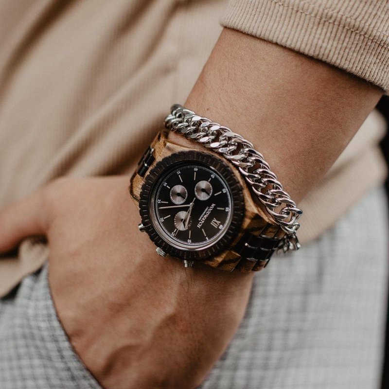 Prepare for adventure with our fully featured, hand-crafted Chronograph wrist watch. This premium design watch features a 45mm zebra case, black stainless steel dial and a SEIKO VD54 movement. The unique new strap combines sustainable ebony and zebra wood
