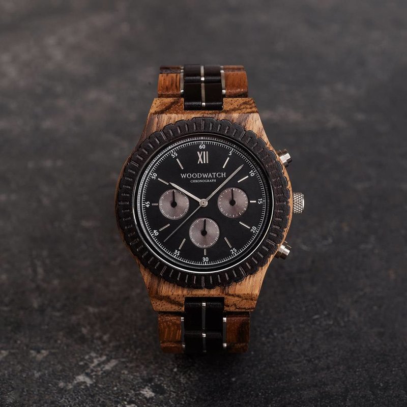 Prepare for adventure with our fully featured, hand-crafted Chronograph wrist watch. This premium design watch features a 45mm zebra case, black stainless steel dial and a SEIKO VD54 movement. The unique new strap combines sustainable ebony and zebra wood