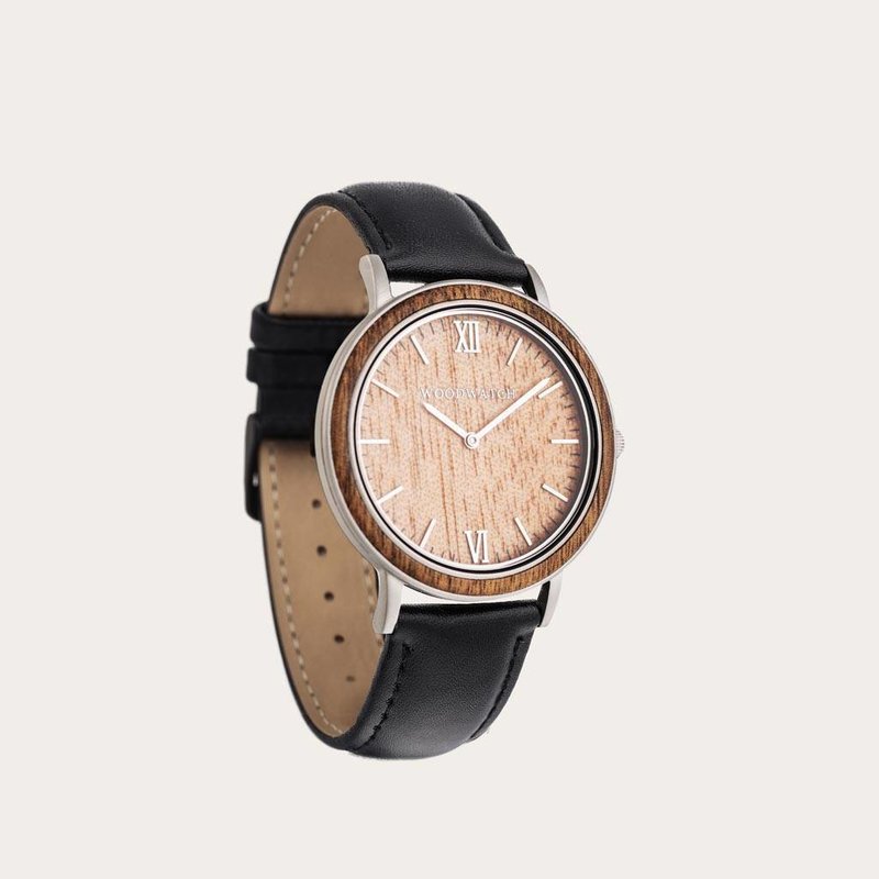 A combination of unique materials with a minimal design to create a timeless look. This modern watch suits both your casual day look and your finest formal wear. A super thin case made of the finest stainless steel. A statement of naturally grained wood.