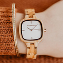 A source of inspiration for each creative artist. The CITY Muse features a square case with a white dial and rose gold details. The watch band consists of soft olive wood that has been hand-finished to perfection and to create our latest small-band design