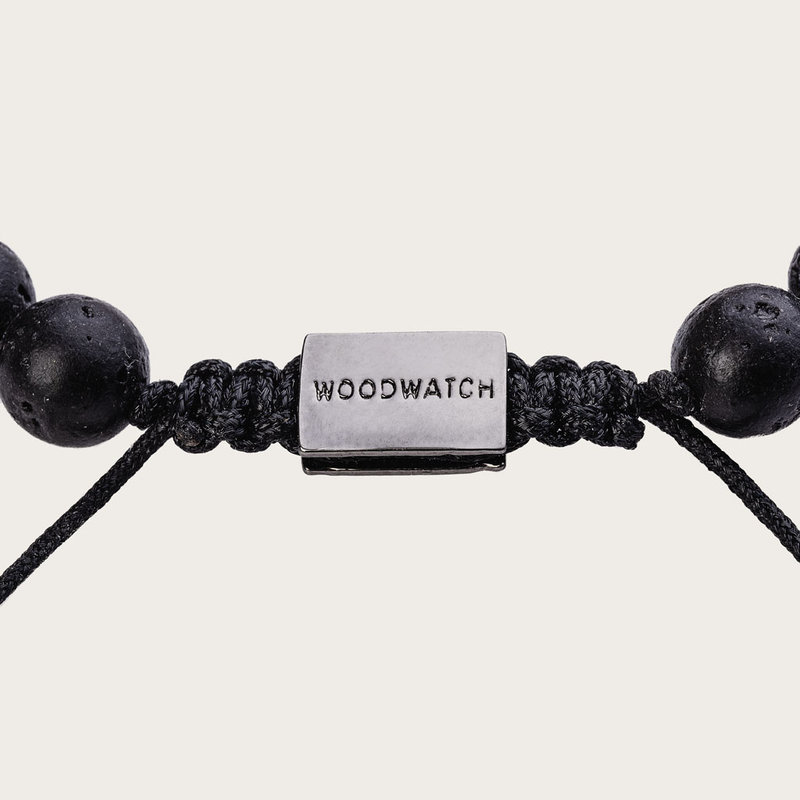 Our handmade Pinewood Volcanic Beads Bracelet features a combination of 8mm Pinewood and Volcanic beads. This bracelet is adjustable and fits most wrist sizes. This bracelet is adjustable and fits most wrist sizes. The perfect accessory to go with any Woo