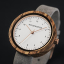 Inspired by contemporary Nordic minimalism. The NORDIC Oslo Grey features a 36mm diameter white zebra wood case with a white dial and rose gold details. Handmade from sustainably sourced wood combined with an ultra soft grey sustainable vegan leather stra