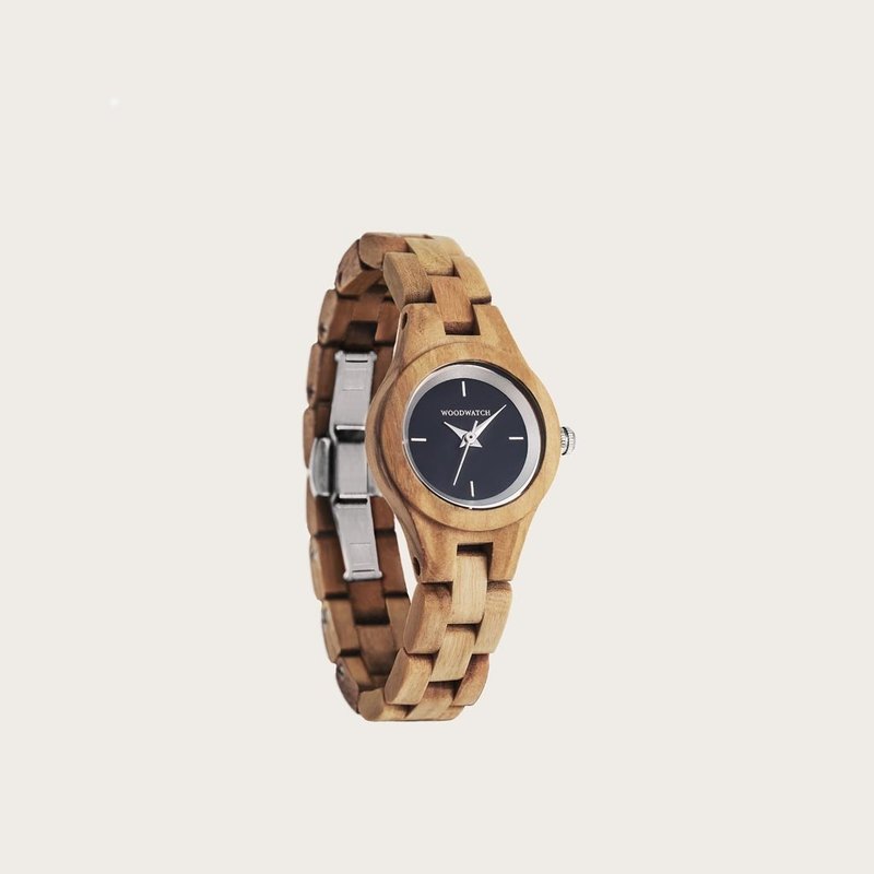 The Iris watch from the FLORA Collection consists of soft olive wood that has been hand-crafted to its finest slenderness. The Iris features a midnight blue dial with silver colored details.