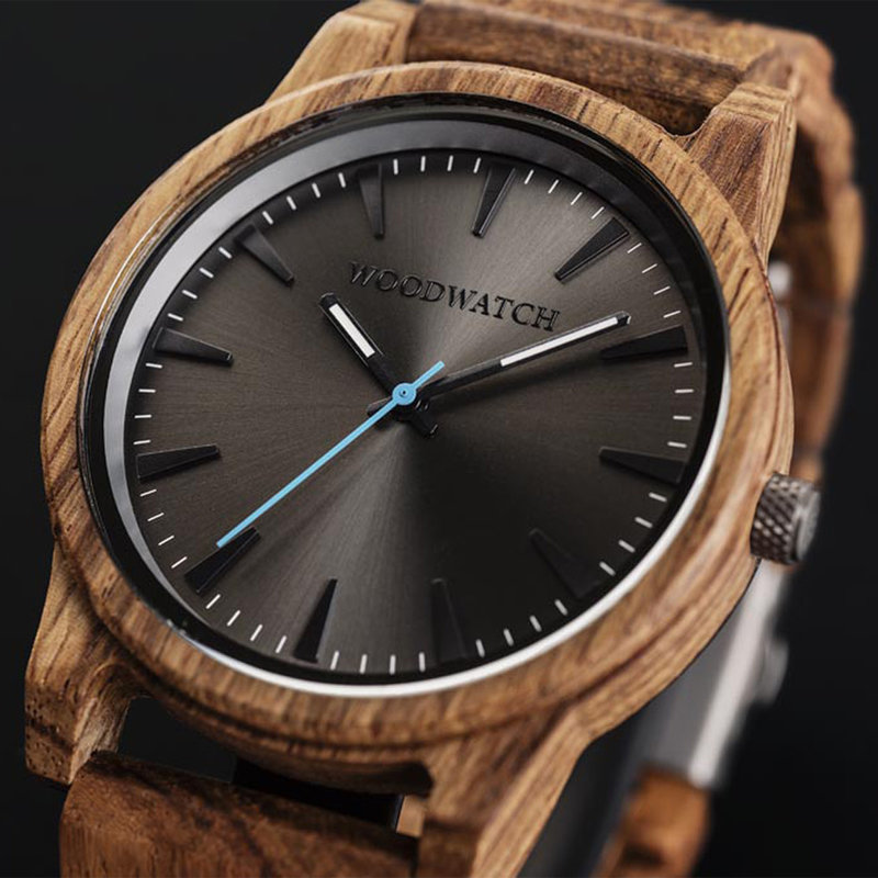 The Reveler Kosso features a modernized minimal grey dial with bold details in a 45mm case. A wrist essential combining natural wood with stainless steel and sapphire coated glass. The Reveler Kosso is handmade from natural Kosso wood from East Africa.