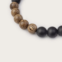 Our handmade Zebrawood Agate Beads Bracelet features a combination of 8mm Zebrawood and Agate beads. This bracelet is adjustable and fits most wrist sizes. The perfect accessory to go with any WoodWatch.