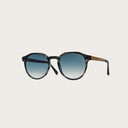 The REVELER Heritage Gradient Blue features a sleek geometric grey tortoise frame with gradient blue lenses. Composed of durable Italian Mazzucchelli bio-acetate with hand-finished natural zebrawood temples and tortoise acetate tips. Bio-acetate is made f