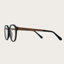 Filter out harmful excess blue light which can cause eye strain, headaches and poor sleep. The Reveler "Black" features a sleek geometric black frame and is composed of durable Italian Mazzucchelli bio-acetate with hand-finished natural rosewood temples a